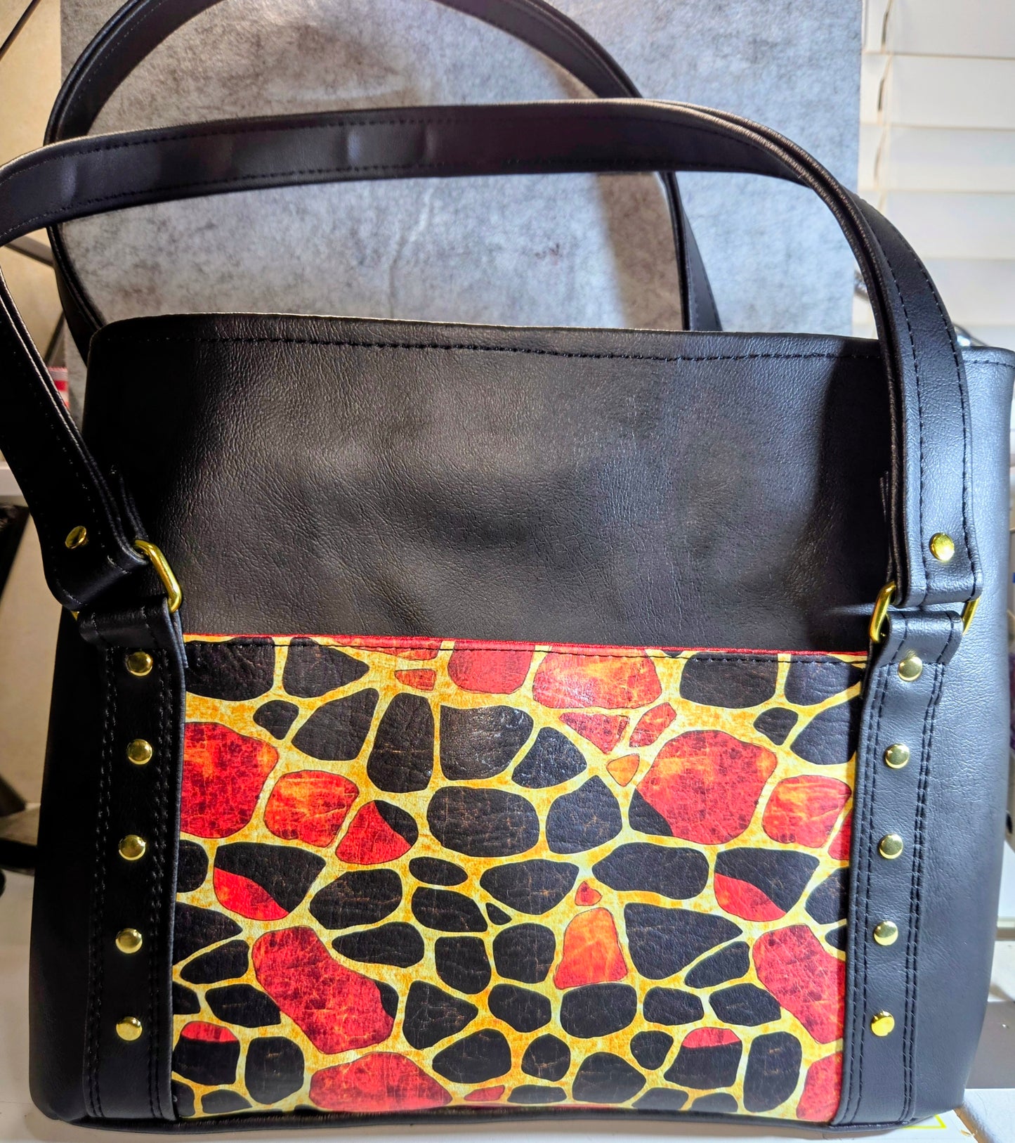 Duplicity handbag