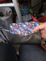 Handmade Harry Potter-themed Mini NCW wallet with colorful blue chibi character fabric flap and black faux leather body.