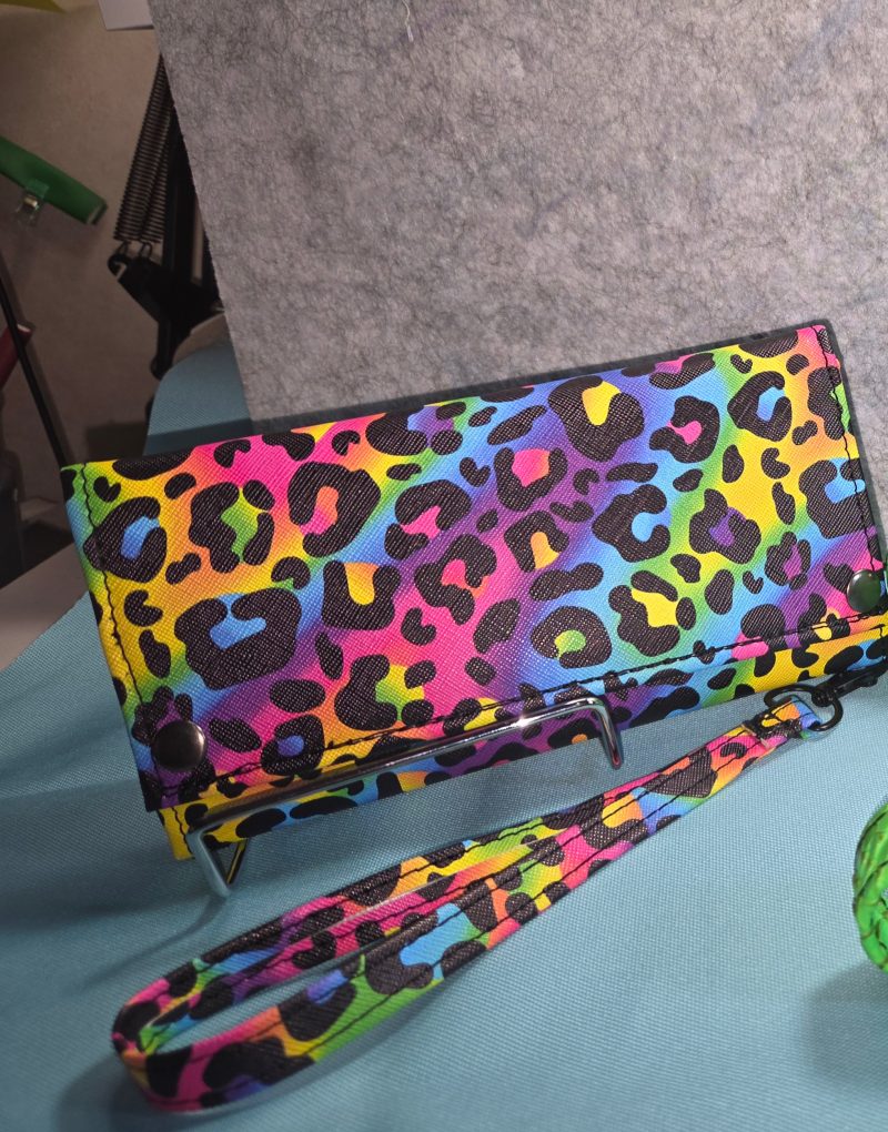 20261017_211706 Handmade Draco rainbow leopard trifold wallet with multicolor animal print, snap closures and matching wristlet strap
