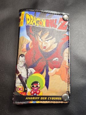 Handmade Mini Draco Dragon Ball Z DVD cover bifold wallet featuring Goku, colorful anime artwork and silver-tone magnetic snaps.