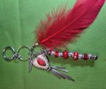 red-southwestern-feather-bag-charm.jpg