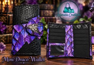 Handmade Mini Draco purple dragon wallet with blue and purple dragon-scale print, black crocodile-textured vinyl and silver dragon snap tab.