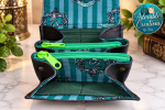 Open Slytherin Mini NCW Wallet showing green interior, card slots and two bright green zippered compartments